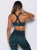 Back view of the Ocean Teal Cheetah Glow Sports Bra built for stay-put support and comfort