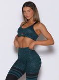Ocean Teal Cheetah Glow Sports Bra with supportive coverage and a flattering athletic shape