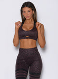 Peppercorn Cheetah Glow Sports Bra with push-up shaping and secure workout support