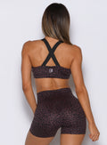 Back view of the Glow Sports Bra in Peppercorn Cheetah with a supportive, stay-in-place fit