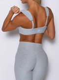 close up back side view of a model wearing the Halo Sports Bra in Ice queen color