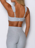 close up back profile view of a model wearing the Halo Sports Bra in Ice queen color