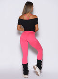 Black Star Power Tee and Neon Flame Hard Body Leggings; sculpting seamless gym activewear set.