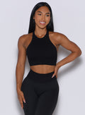 Front profile view of our model wearing  the Lifter Seamless Bra in Black color