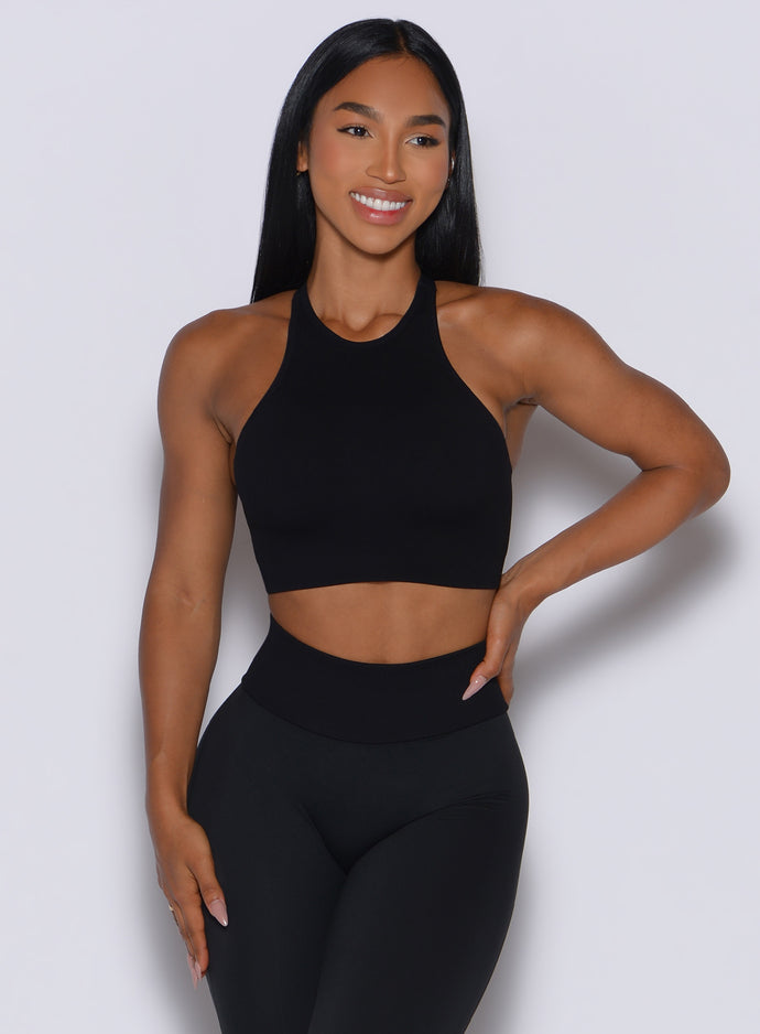 Front profile view of our model wearing  the Lifter Seamless Bra in Black color