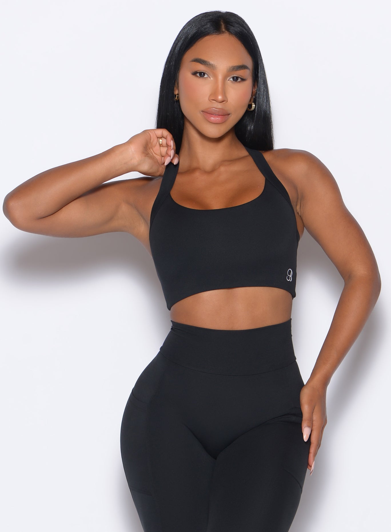 Black High Impact Bra with thick straps and hook-and-eye back closure for intense gym-ready support.