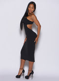 left side  profile picture of a model wearing our black hourglass dress