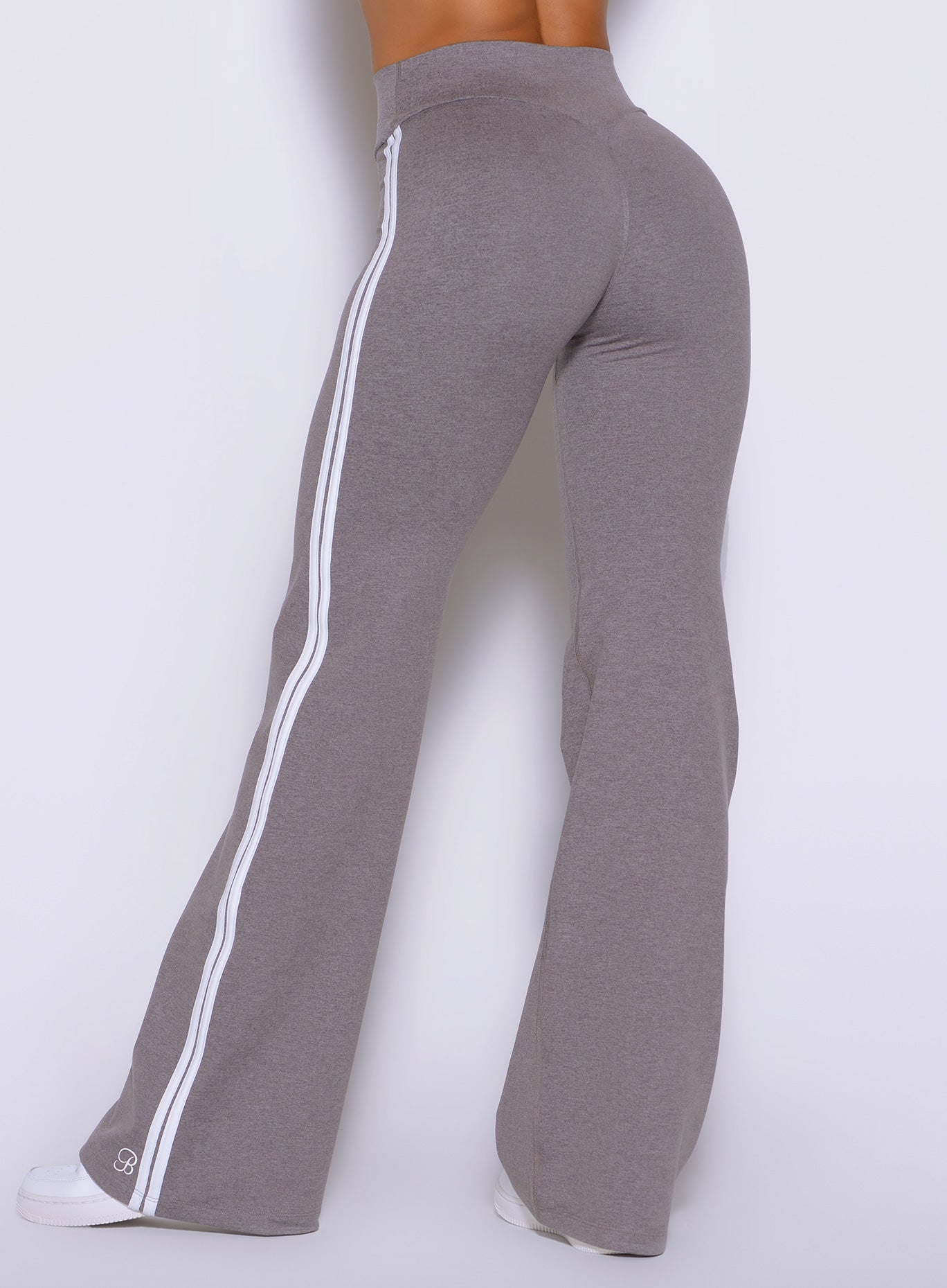 Double stripe binding frames the outer legs of the Champion Gray Inline Straight Leggings from behind
