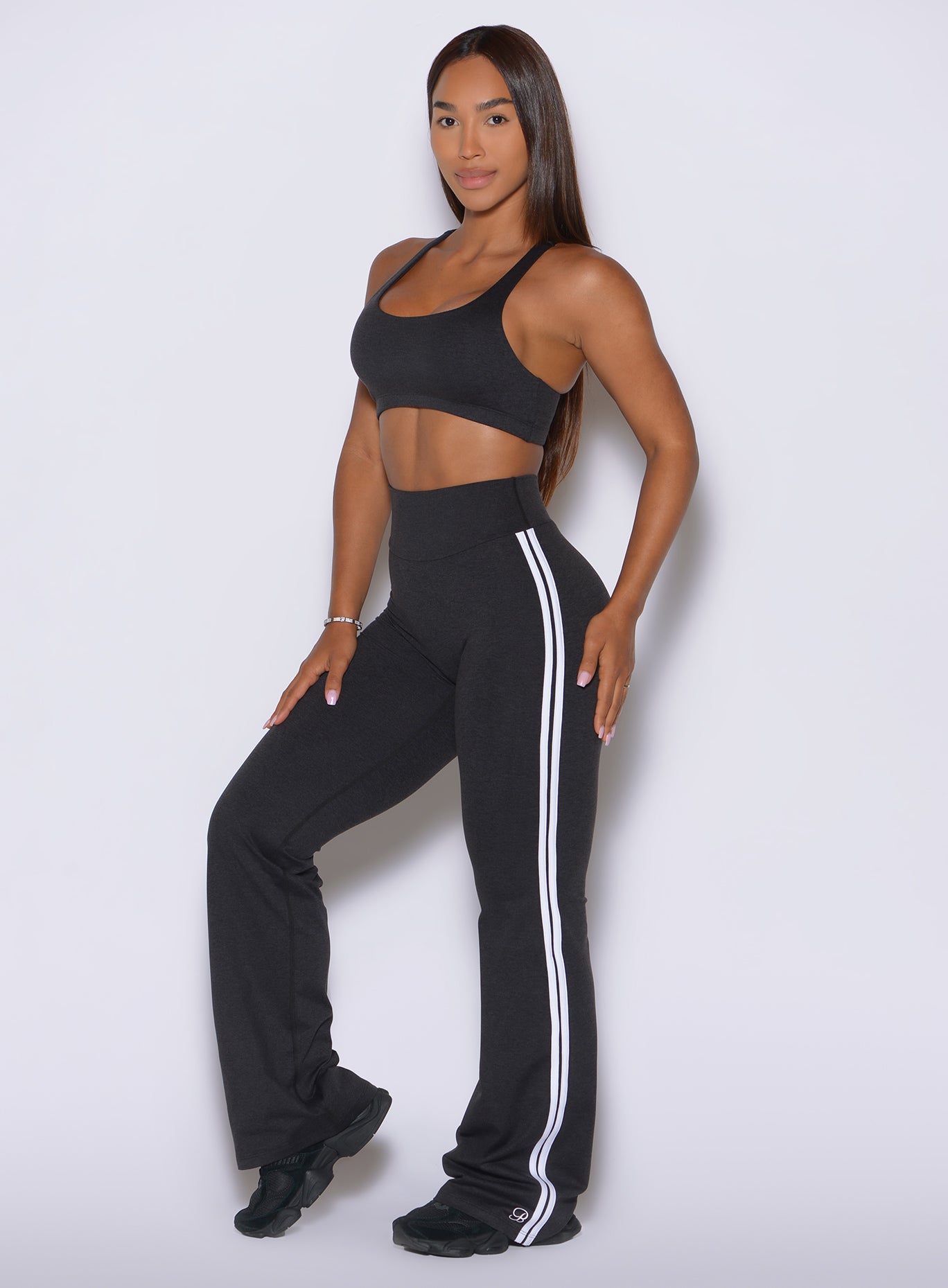 The straight-leg cut creates a clean, elongated profile in Obsidian Black Inline Leggings