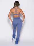 back profile view of a model wearing the Internal Scrunch Leggings in blue chill color 