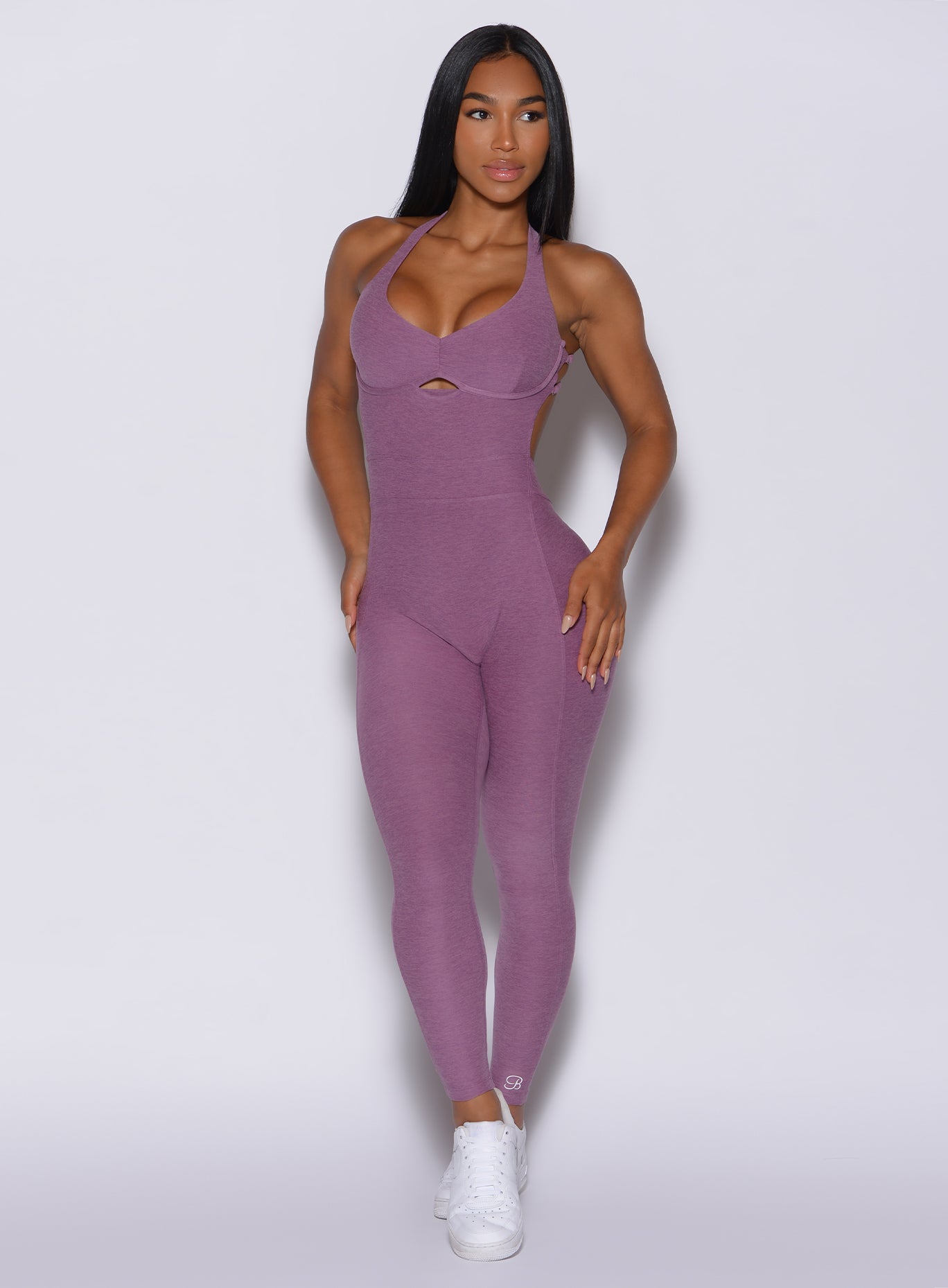 front profile view of a model in our lavender bombshell bodysuit 