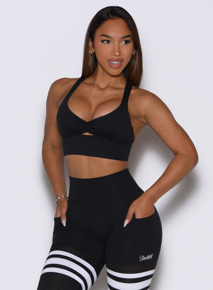 Black Keyhole Bralette with a ruched front and center cutout for stylish low-impact support.