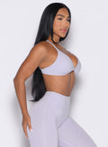 right side profile view of a model wearing the Kini Bra in Galactic Lilac color