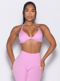front profile view of a model with both hands on her thighs wearing the Kini Bra in Lilac Chiffon color