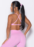 back profile view of a model looking to the left side wearing the Kini Bra in Lilac Chiffon color