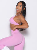 left side profile view of a model wearing the Kini Bra in Lilac Chiffon color