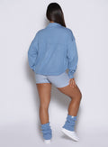 back profile view of a model wearing the laidback luxe shirt in Niagara mist color