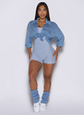 front view of a model wearing the laidback luxe shirt in Niagara mist color with both frontal sides tied together