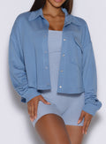close up front view of a model wearing the laidback luxe shirt in Niagara mist color