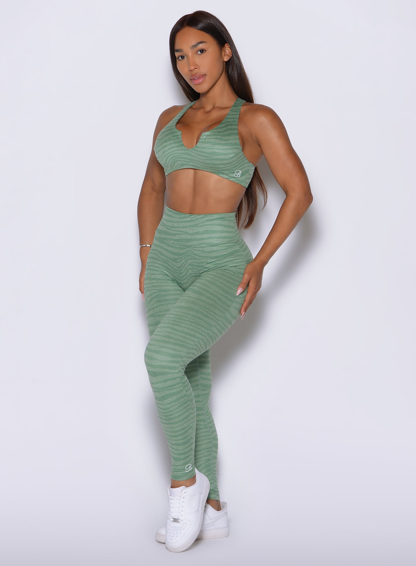 Every stride feels supported in Lift Movement Leggings with basil zebra print and sculpting stretch
