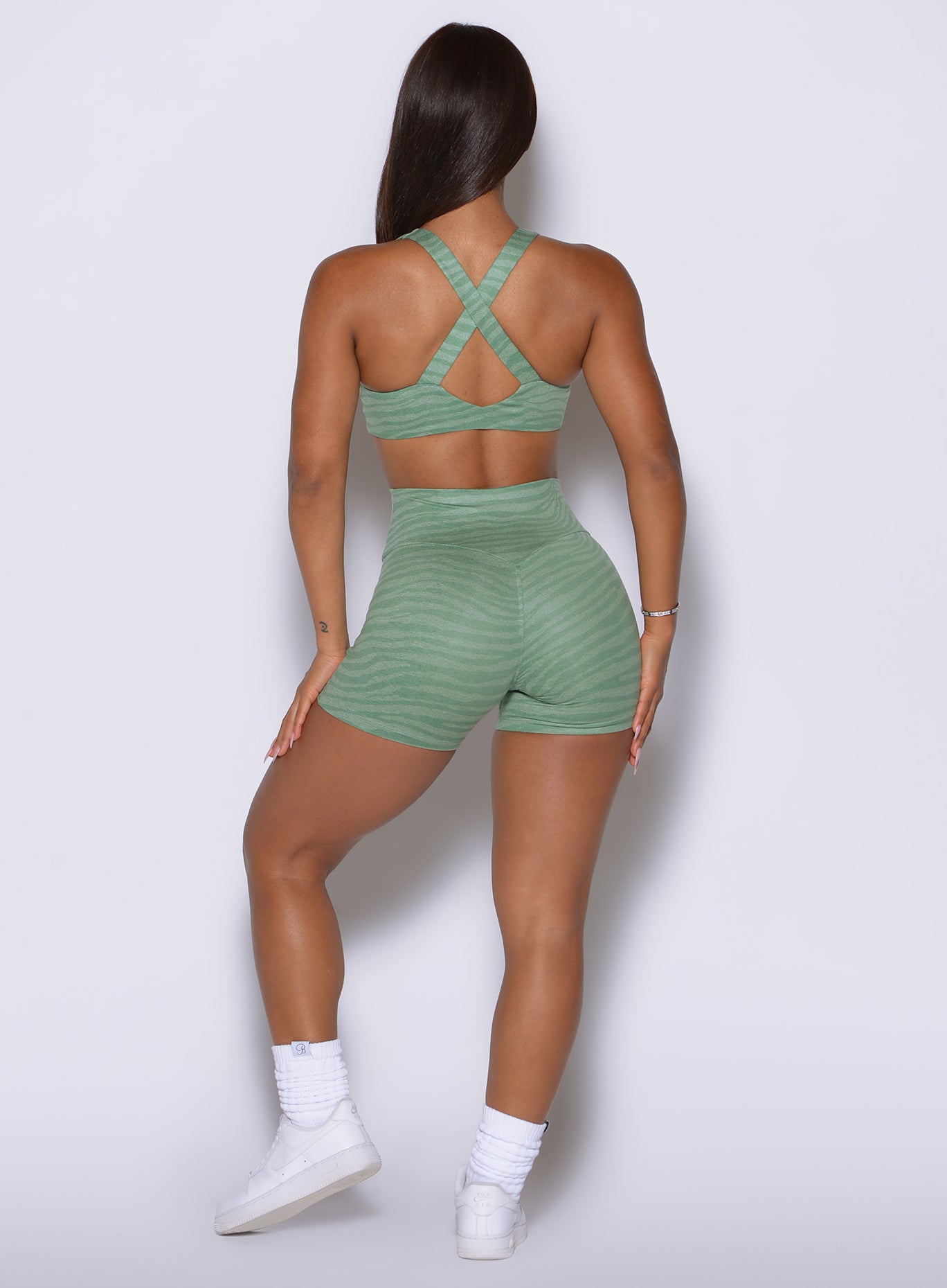 A lifted, sculpted silhouette comes from the hidden scrunch and sweetheart seam on these basil zebra shorts