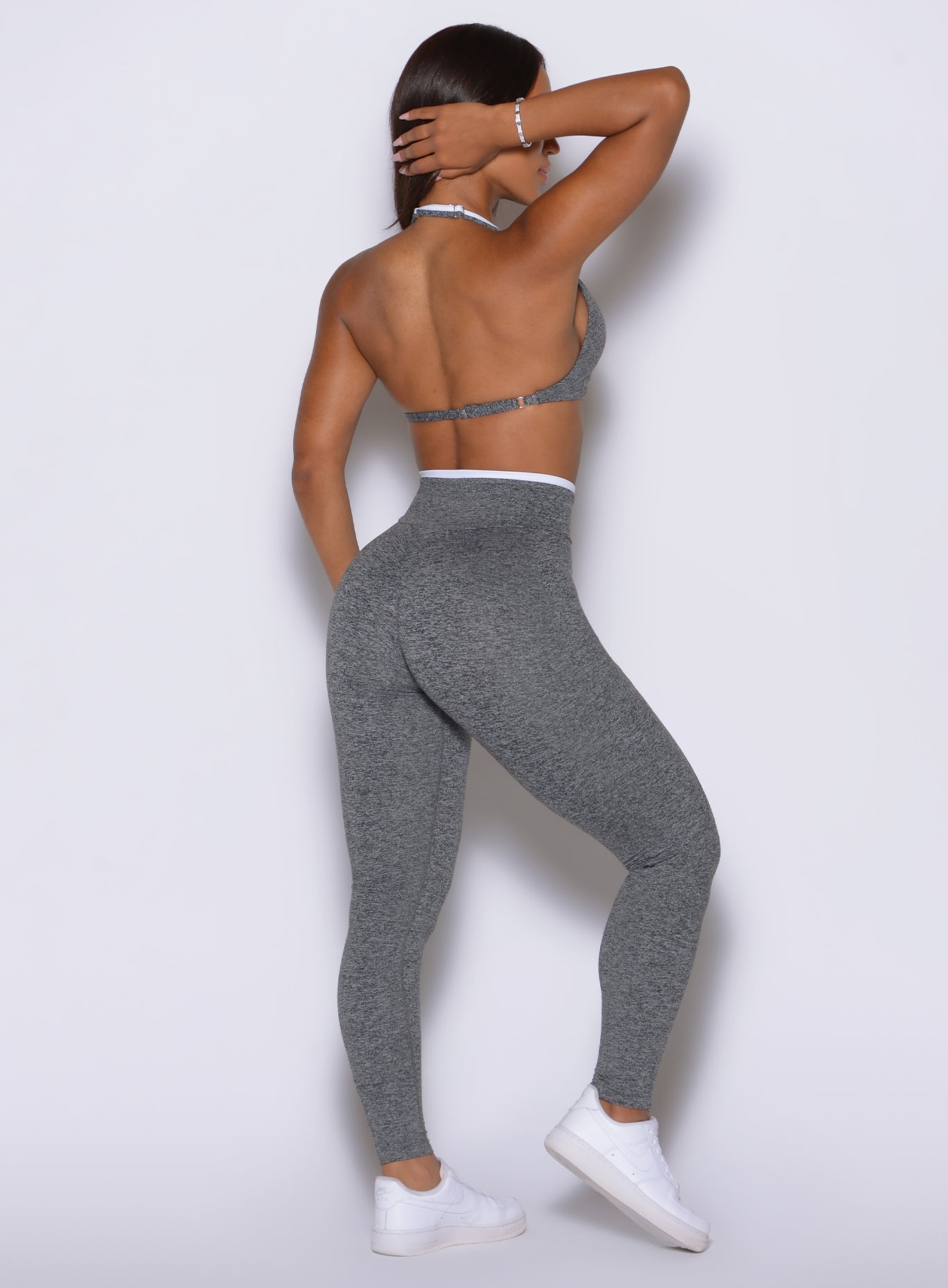 Scrunch contouring enhances these Heather Gray/Black leggings with side pockets and smooth support