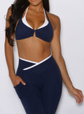 close up detailed front view of a model wearing the Line Contour Leggings in navy color 