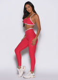Raspberry Punch Line Contour Leggings with white side piping and a sculpting high-waisted fit.