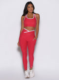 Raspberry Punch Line Contour Leggings with high-waisted V-cut, side pockets, and sculpting seams.