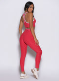 Raspberry Punch Line Contour Leggings with a V-cut waist and sculpting, seamless performance fit.