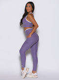 Violet Line Contour Leggings with white contrast piping and a sculpting high-waisted v-cut fit.
