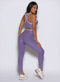Violet Line Contour Leggings with white detailing and a sculpting, high-waisted performance fit.