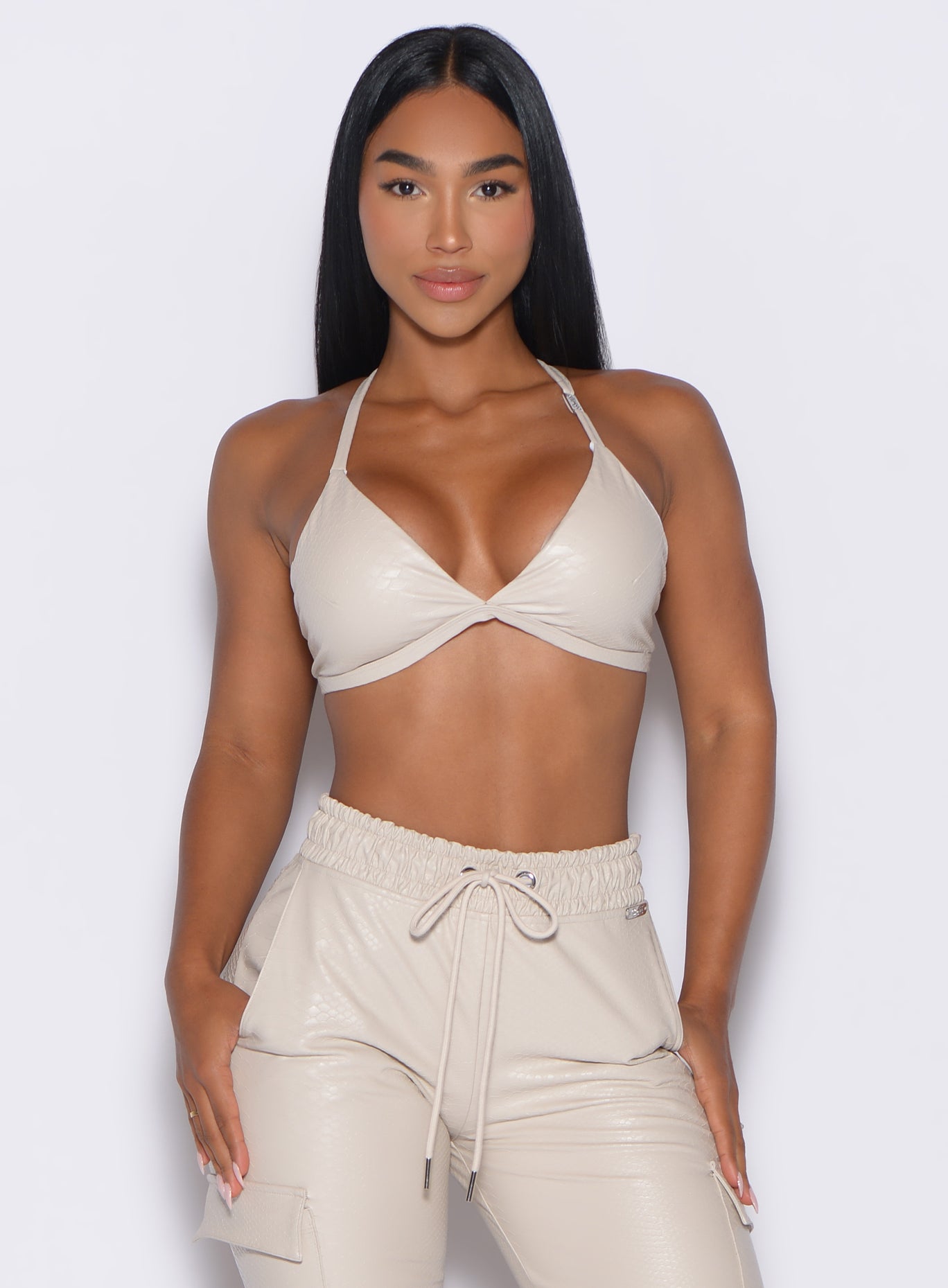 Champagne Liquid Kini Bra in textured faux leather with a deep V-neck for chic day-to-night style.