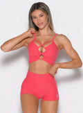 Loop Luxe Bra Top in Watermelon Punch featuring a ruched front and peekaboo sculpting design.