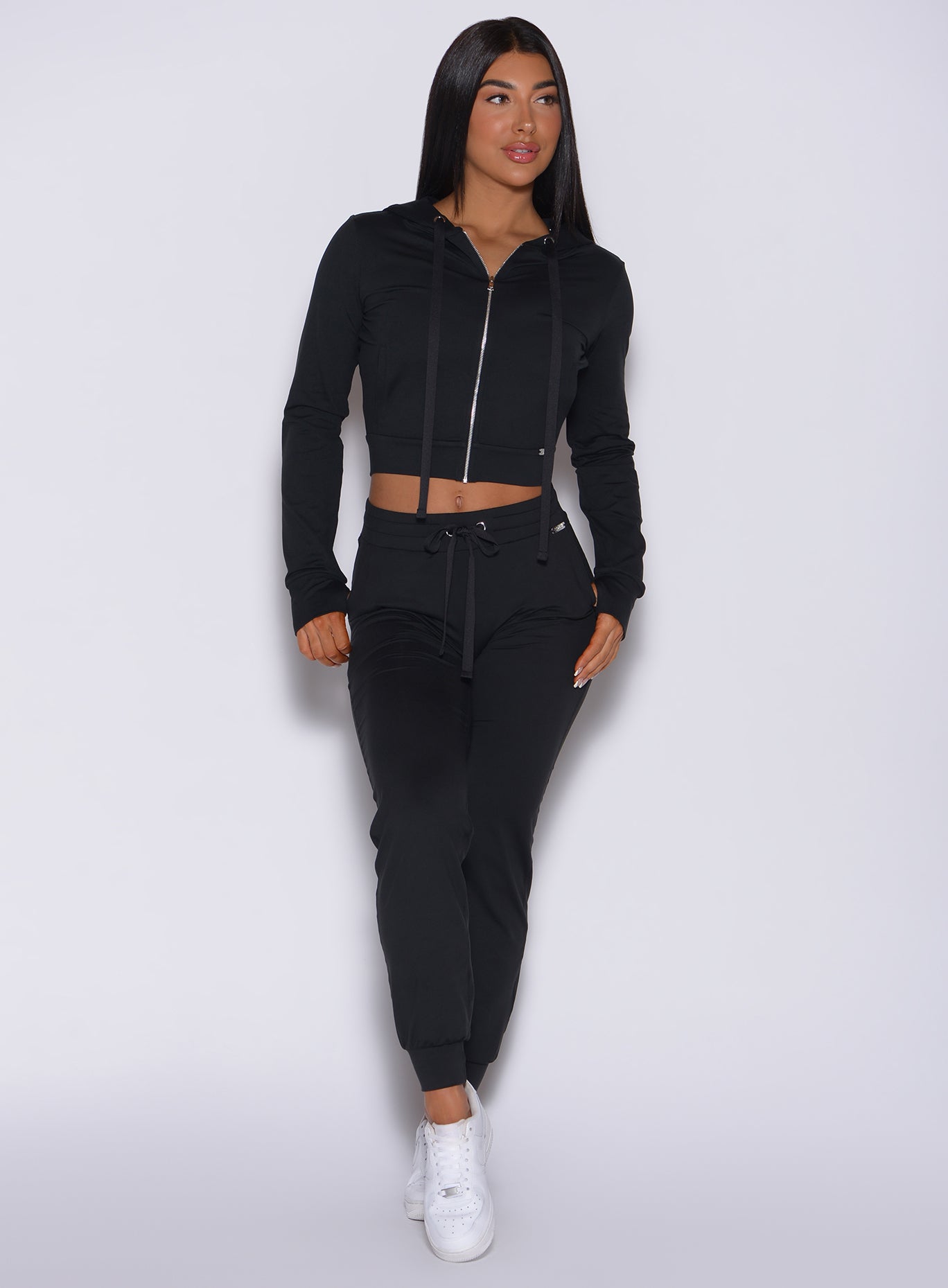 front view of model wearing the signature jacket and cozy joggers in black