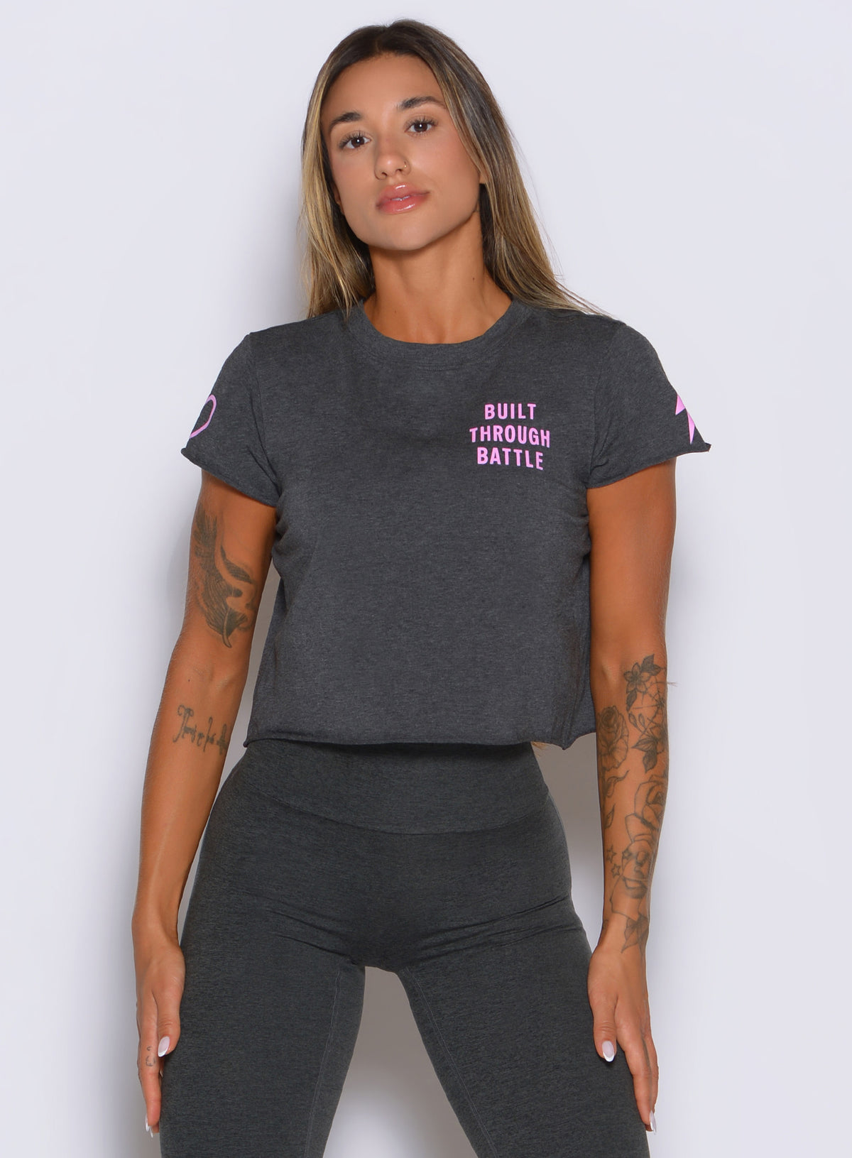 Charcoal Lover Fighter Tee by Bombshell Sportswear with pink Built Through Battle front graphic.