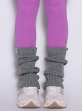 close up front view of a model wearing the Luxe Leg warmers-short in core gray color