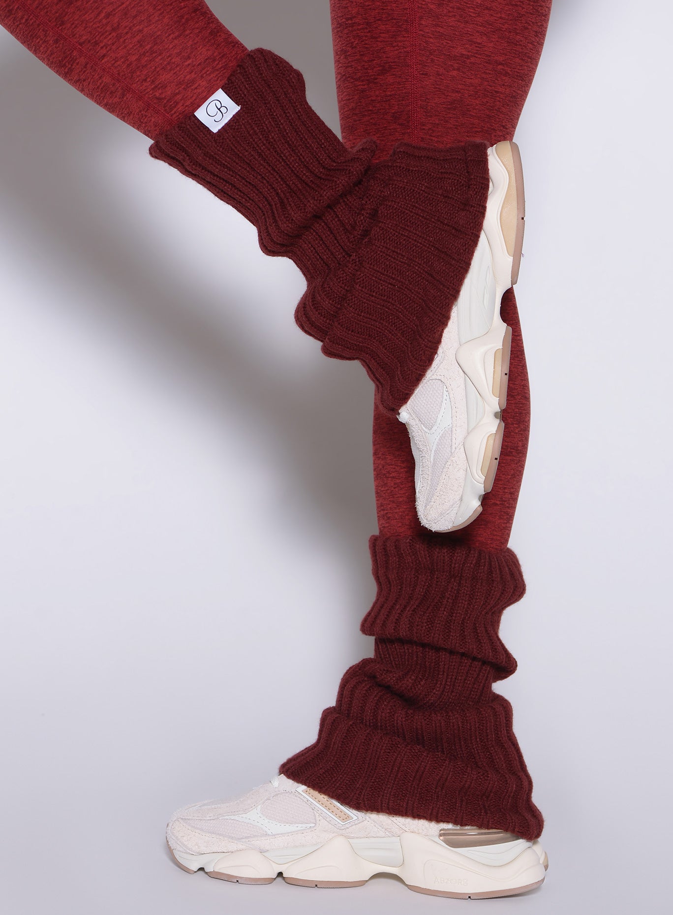 Short Luxe Leg Warmers in Rouge; chunky ribbed knit delivers a bold, retro-athletic fitness look.