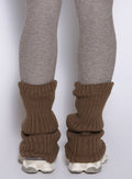 close up view of a model from the back wearing the Luxe Leg warmers-short in smoked taupe color