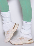 White Luxe Leg Warmers in a chunky rib knit, featuring a soft pull-on fit and sporty gym style.