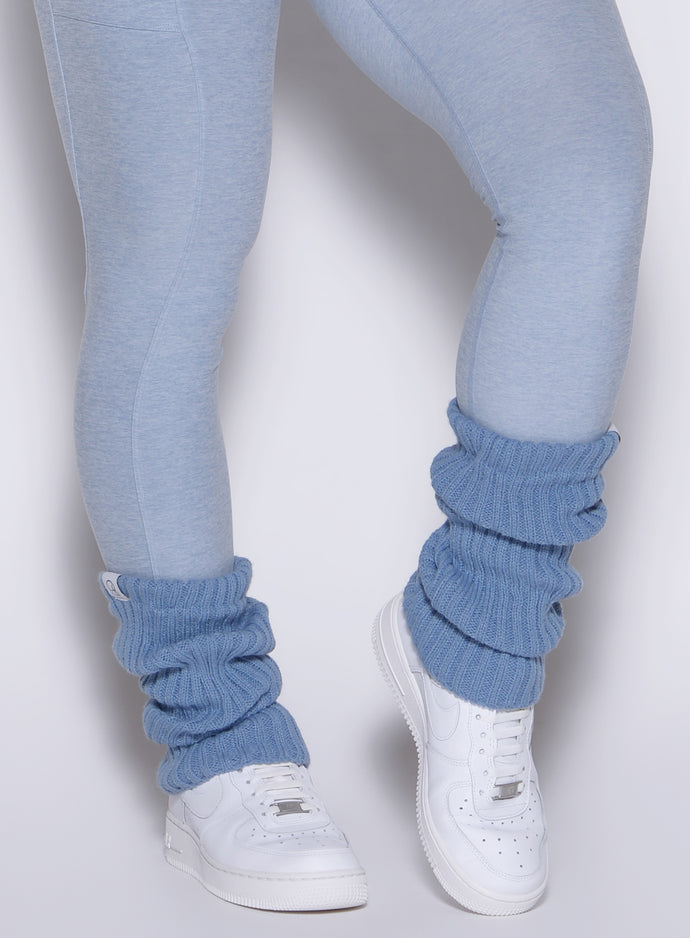 detailed front view of a model wearing the luxe leg warmers-short in niagara mist color
