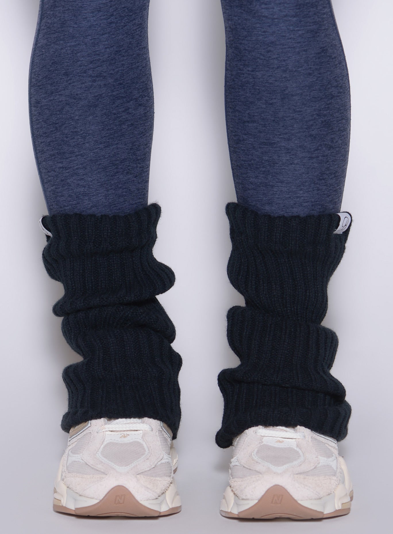 Space Blue Luxe Leg Warmers in a chunky rib knit; short pull-on style for bold gym performance.