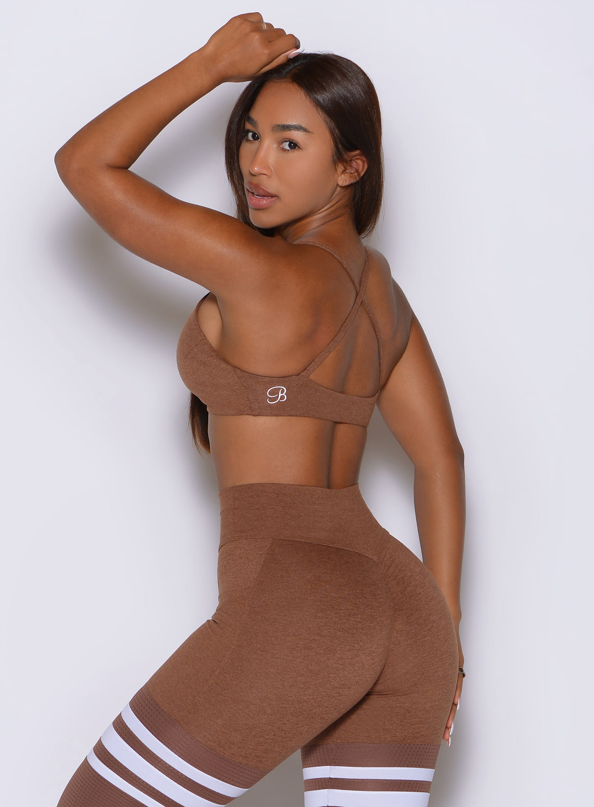 Slim crossover straps create an elegant open-back detail on the Coffee Bean ME Sports Bra