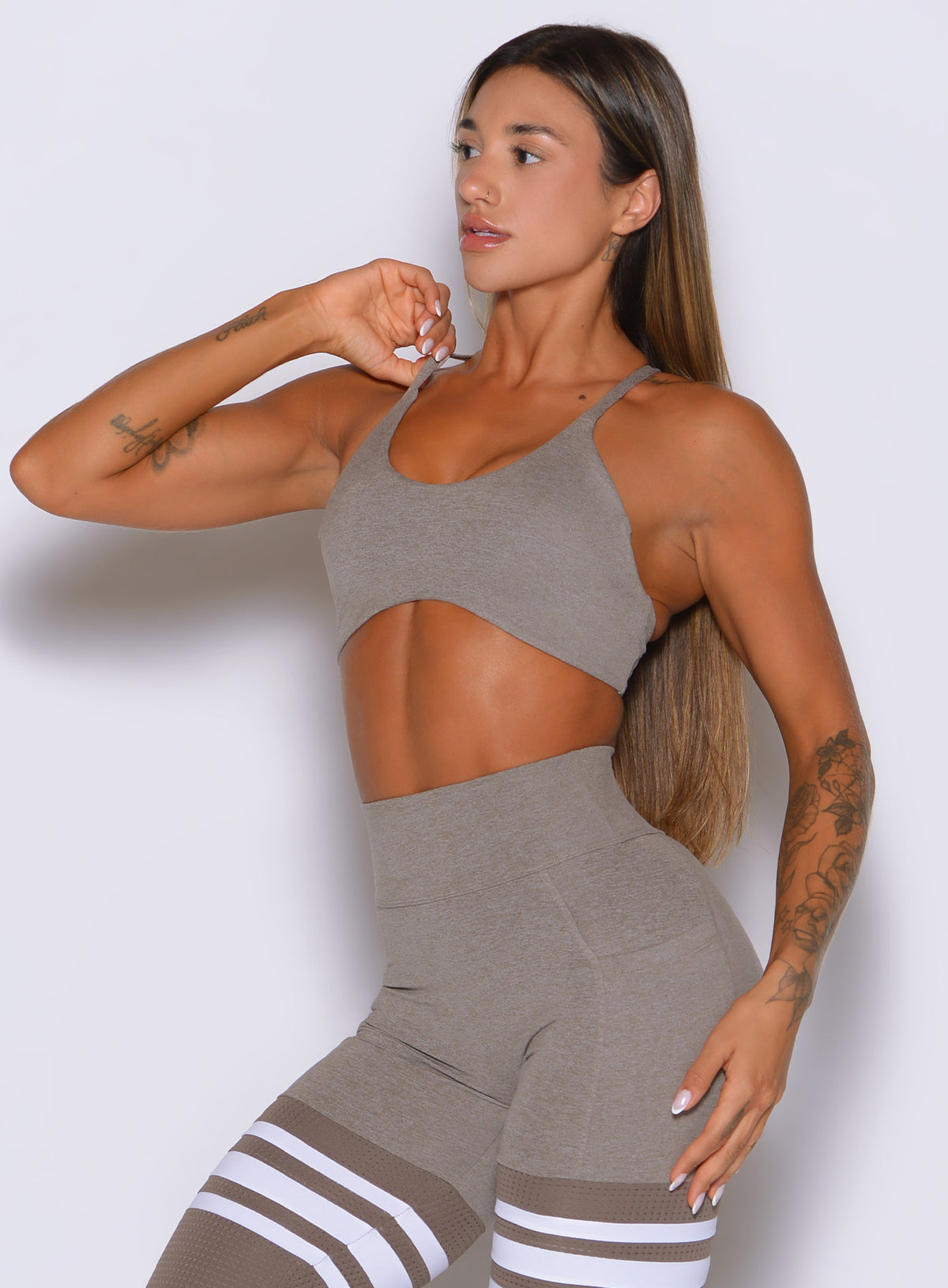 The ME Sports Bra in Smoked Taupe balances a low scoop neckline with smooth stretch comfort