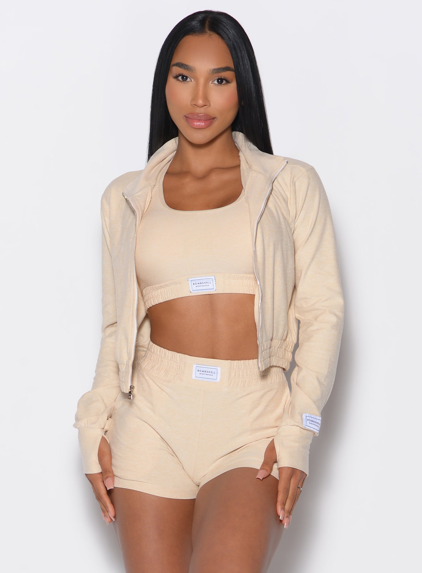 Vanilla Cloud Full Length Jacket with a mock neck and zip-front for a sleek, breathable active layer.