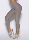 Smoked Taupe Movement 7/8 Leggings featuring glute-sculpting seams for a performance-ready fit.