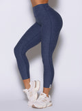 Space Blue Movement 7/8 Leggings in a close side profile, featuring buttery soft, gym-ready fabric.