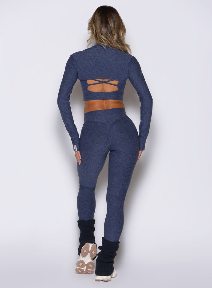 Glute-sculpting Space Blue Movement 7/8 Leggings in heathered fabric for high-impact studio flows.