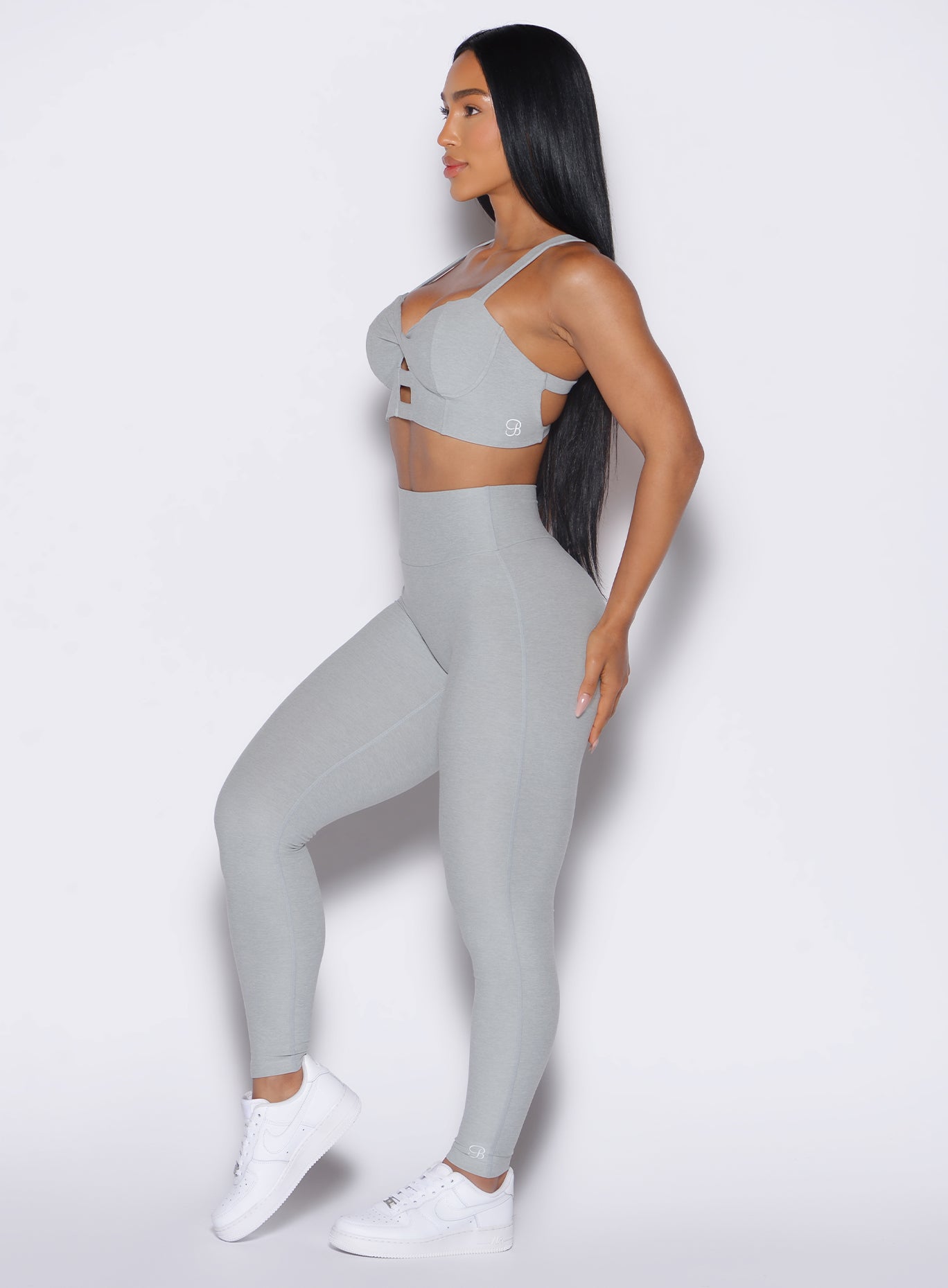 Buttery soft Movement Leggings in Light Cloud; high-waisted, heathered, and squat-proof gym fit.
