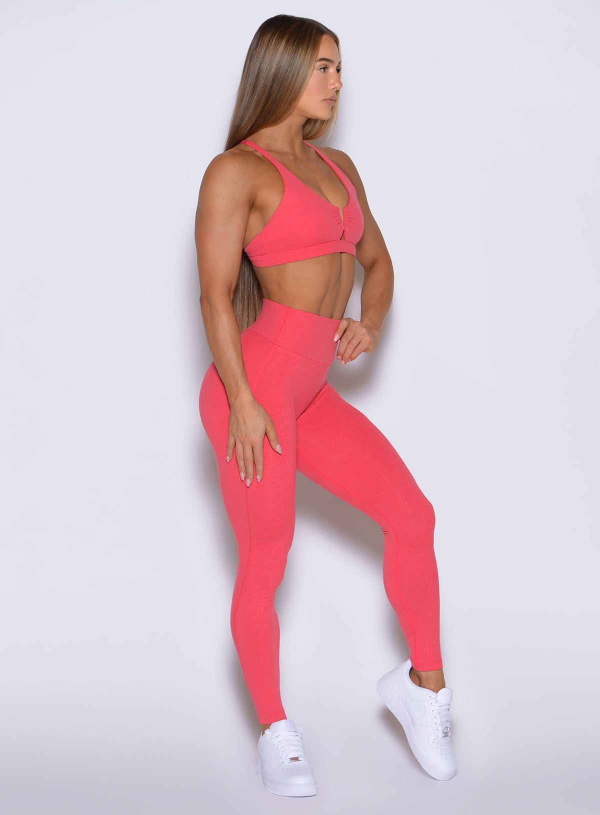 High-waisted Watermelon Punch Movement Leggings create a smooth, sculpted side profile